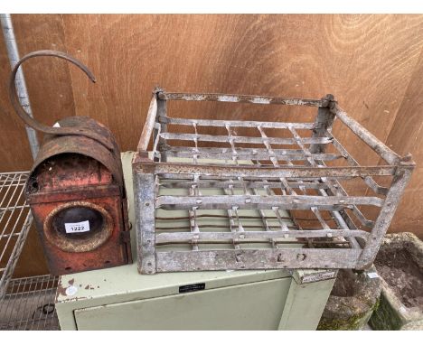 A VINTAGE GALVANISED MILK BOTTLE CRATE AND A VINTAGE ROAD LAMP 