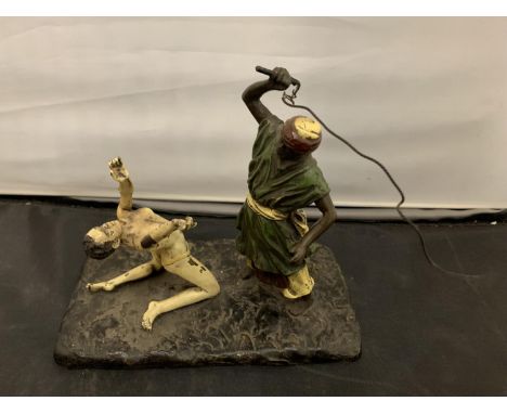 A BERGMAN STYLE COLD PAINTED BRONZE OF A NATIVE AND A WOMAN HEIGHT APPROXIMATELY 15CM 