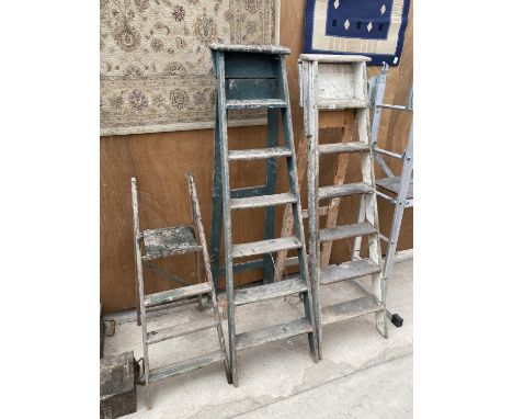 TWO SETS OF VINTAGE SIX RUNG WOODEN STEP LADDERS AND A FURTHER THREE RUNG WOODEN STEP LADDER 