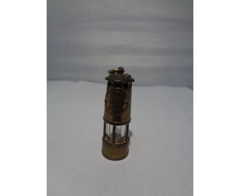 A MINIATURE BRASS MINERS STYLE LAMP PENDANT 