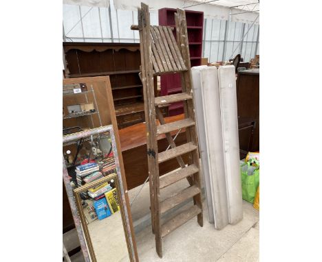 A VINTAGE SIX RUNG WOODEN STEP LADDER 