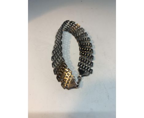 A SILVER GATE BRACELET 