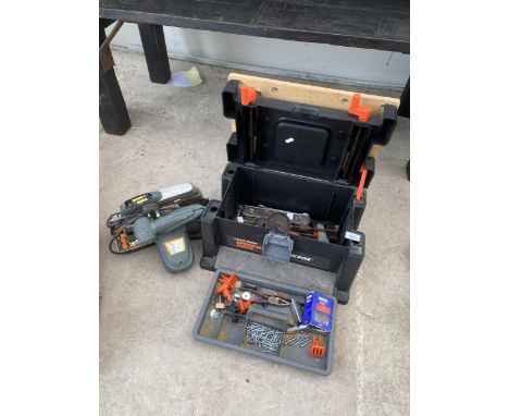 A TOOL BOX WITH A BRACE DRILL AN ELECTRIC RIP SAW AND FURTHER TOOLS ETC 