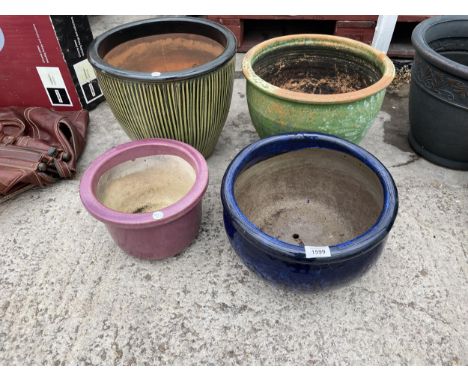 FOUR CERAMIC GARDEN PLANTERS 