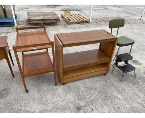 A TEAK TEA TROLLEY, A SERVING UNIT AND A RETRO KITCHEN STEP SEAT 