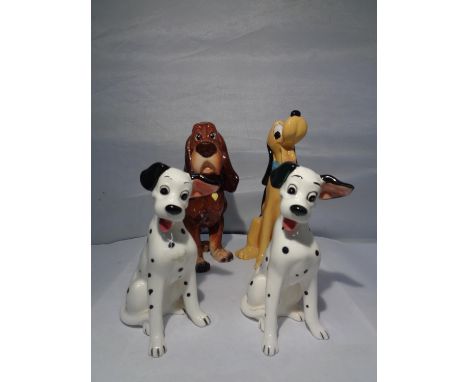 FOUR CERAMIC DISNEY CHARACTER DOGS 