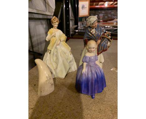 THREE FIGURINES TO INCLUDE A ROYAL WORCESTER FIRST DANCE, A ROYAL DOULTON GRANDMA HN 2052 (A/F) ANDA ROYAL DOULTON MARIE H.N.