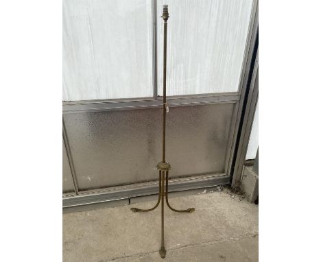 A GILT METAL STANDARD LAMP ON SPLAT BASE 
