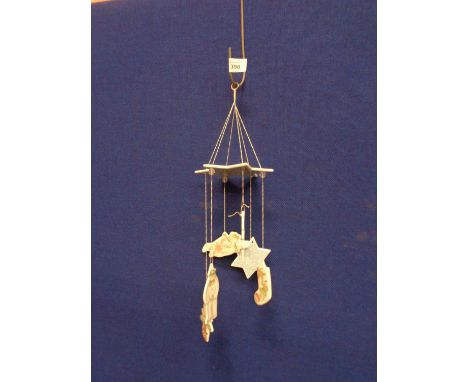 A ROYAL DOULTON 'THE SNOWMAN' HANGING CERAMIC MOBILE 