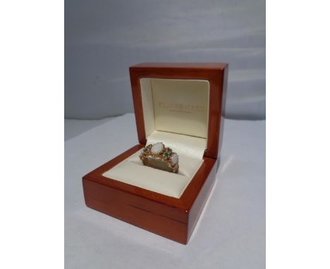 A BOXED 9CT GOLD OPAL AND EMERALD RING 