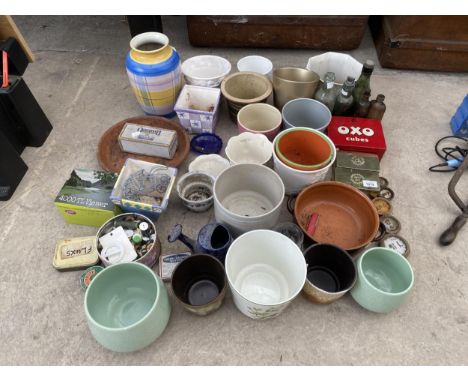 AN ASSORTMENT OF CERAMIC PLANTERS, VINTAGE BOTTLES AND TINS ETC 