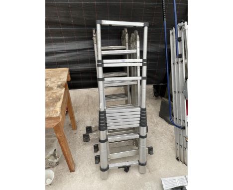 A TELESCOPIC EXTENDING LADDER AND TWO SETS OF FOLDING LADDERS 