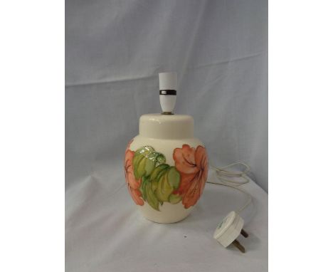 A MOORCROFT HIBISCUS LAMP 