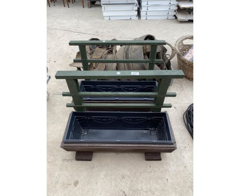 A PAIR OF WOODEN PLANTER TROUGHS 
