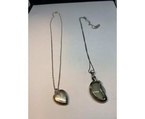 TWO SILVER NECKLACES WITH PENDANTS TO INCLUDE A HEART SHAPED LOCKET AND A JADE STYLE STONE IN AN ABSTRACT DESIGN 