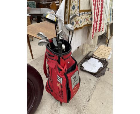 A KING COBRA GOLF BAG WITH AN ASSORTMENT OF CLUBS TO INCLUDE DUNLOP AND FAZER ETC 