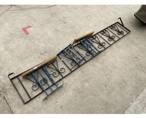AN ASSORTMENT OF DECORATIVE AND TURNED WROUGHT IRON RAILING PANELS 