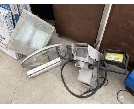 AN ASSORTMENT OF OUTSIDE LIGHT FITTINGS ONE WITH A SECURITY CAMERA 