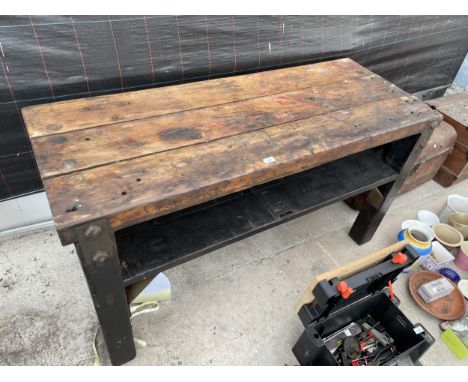 A VINTAGE HEAVY DUTY WORK BENCH WITH LOWER SHELF 