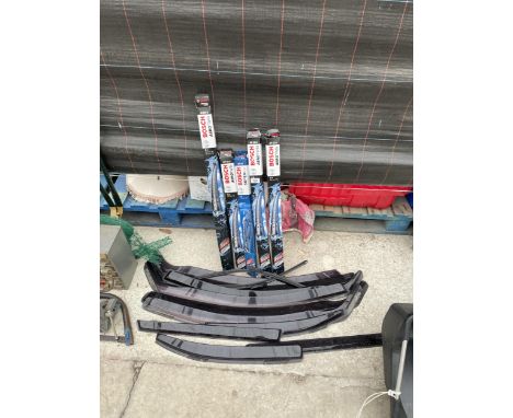 AN ASSORTMENT OF AUTOMOBILE SPARES TO INCLUDE WINDSCREEN WIPERS AND SHIELDS ETC 
