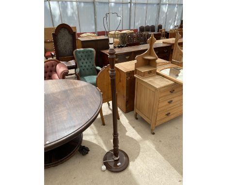 A STANDARD LAMP WITH TURNED AND FLUTED COLUMN 