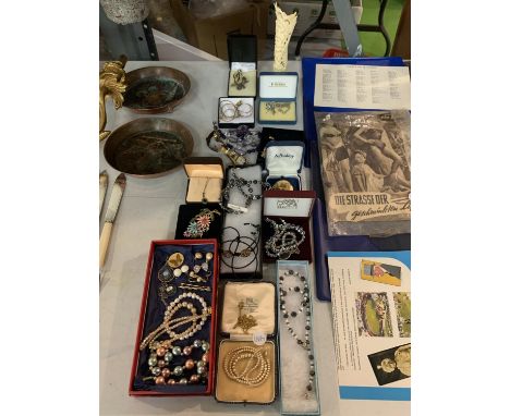A LARGE COLLECTION OF COSTUME JEWELLERY INLCUDING NECKLACES, EARRINGS, BROOCHES, A TIMEX AND A LORUS WATCH ETC. 