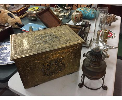 A BRASS DECORATIVE COAL BOX AND A STYLISH OIL LAMP ON STAND 