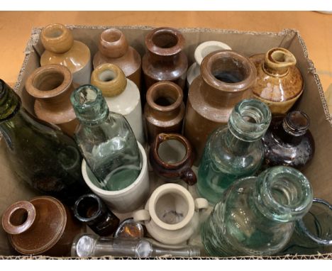 A LARGE COLLECTION OF STONEWARE VESSLES AND VINTAGE BOTTLES TO INCLUDE R. STOTHERT &amp; SONS ATHERTON, TIMOTHY WHITE LTD. ET