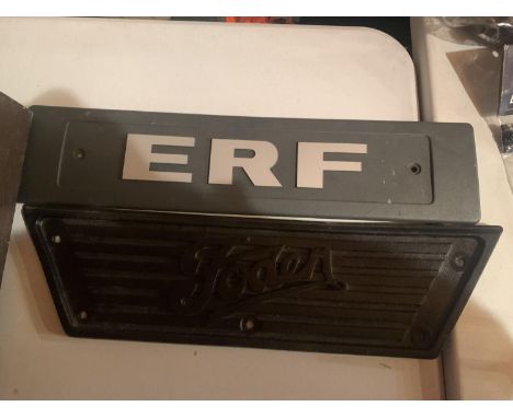 AN ERF SIGN AND A FODEN STEP GRIP 