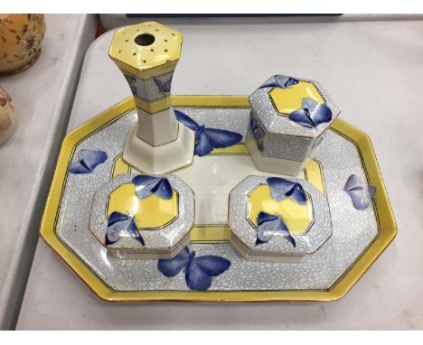 AN ART DECO STYLE BLUE, YELLOW AND GOLD RIMMED DRESSING TABLE SET COMPRISING TRAY, LIDDED TRINKET DISHES ETC. WITH BUTTERFLY 