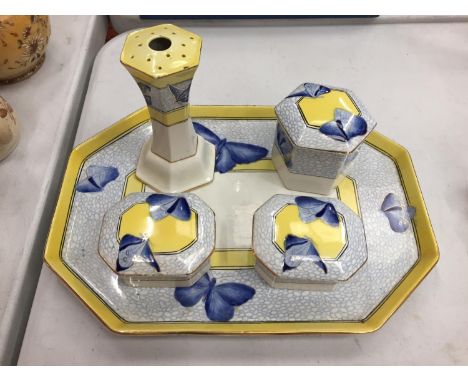 AN ART DECO STYLE BLUE, YELLOW AND GOLD RIMMED DRESSING TABLE SET COMPRISING TRAY, LIDDED TRINKET DISHES ETC. WITH BUTTERFLY 