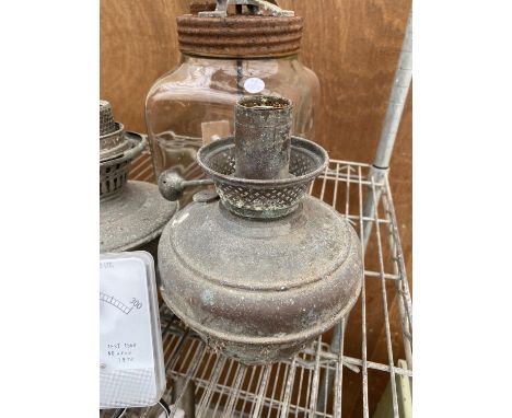 A VINTAGE GLASS BUTTER CHURN, TWO VINTAGE OIL LAMP AND A VOLTMETER 