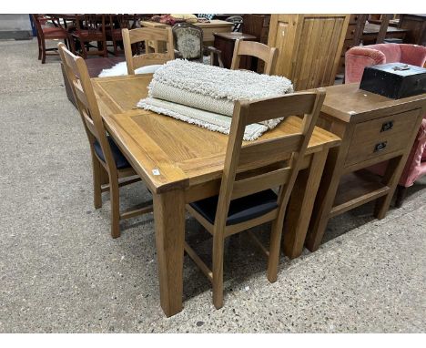 Modern extending oak dining table and four chairs