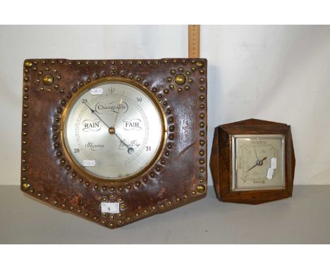 Mixed Lot: Aneroid barometer in leather and brass studded frame together with a further oak cased example (2)