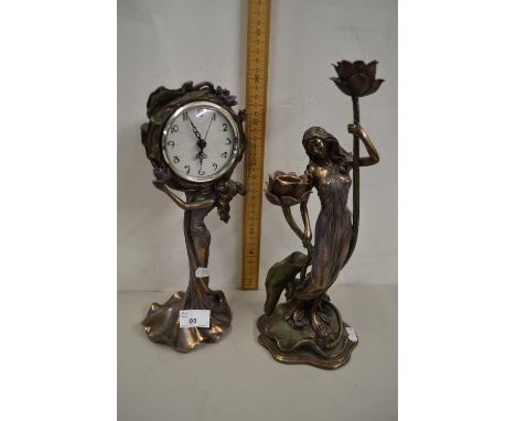 A bronzed resin  model of an Art Nouveau young lady together with a similar mantel clock