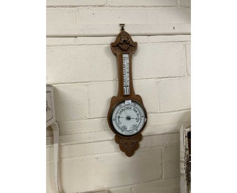 An early 20th Century oak cased barometer