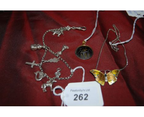 Silve r & Enamel Butterfly Pendant on Chain , a sliver Charm Bracelet with 8 Charms & a Japanese applied Gold & silver pendan