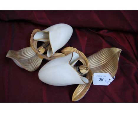 1 pair Royal worcester porcelain gilded wall pocket vases in the form of flower buds.