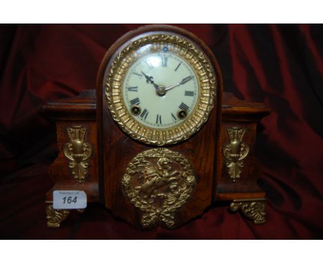 Antique American federal period Ansonia striking mantel clock in a Mahog/case with gilded metal decoration depicting Pegasus 