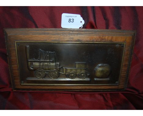 Embost plaque of Locomotion Steam Engine 1825 on Oak setting.