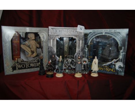 3 Lord of the Rings collectors DVD sets together with 2 die cast figure The Balrog & Boromir & 6 chess pieces.