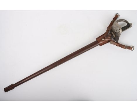 George V 1897 Pattern Infantry Officers Sword, regulation pattern with George V cipher to the guard. Housed in brown leather 