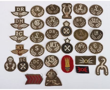 Selection of British Army Cloth trade badges. Lot includes examples of Royal Artillery Master Gunner, Despatch Rider, Driver 