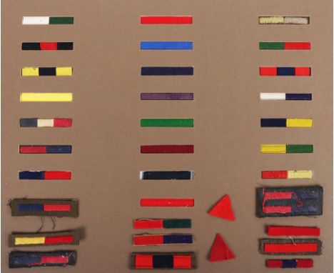Collection of cloth British Army Arms of Service strips, presented on a cardboard backing. Badges within this lot are Royal A