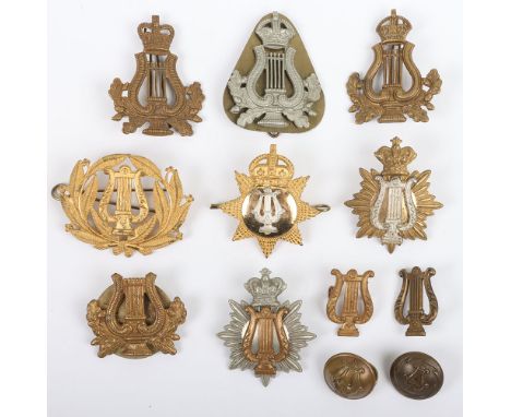 Assortment of various British Army Bandsmen cap, collar, buttons and sleeve badges. Lot includes Silver & Gilt Victorian & Ge