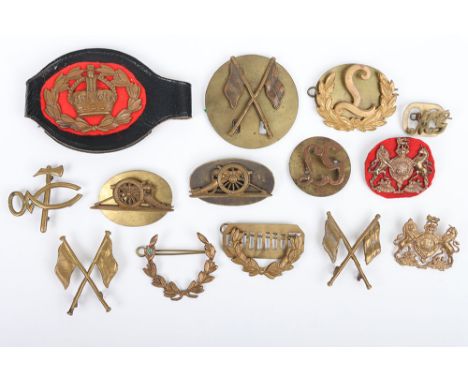 Collection of various British Army Trade badges. Lot includes examples of Lewis Gunner, Machine Gunner ,signaller and a Warra