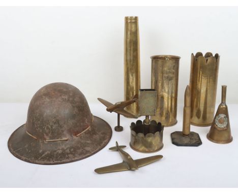 Trench Art: Mostly brass shell trench art to include a match box cover, Hampshire badged bell , lighter,  two engraved WW1 sh