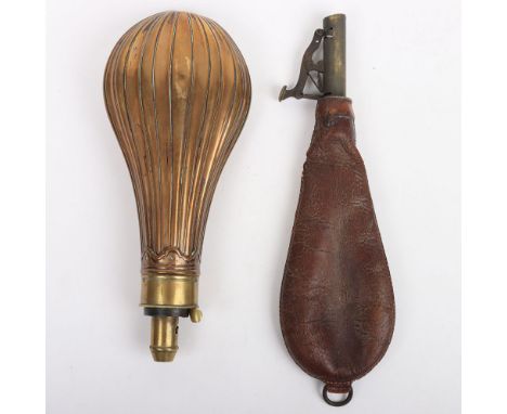 Vintage Shot and Powder Flasks: Brown leather shot flask with brass mounts and brass/copper  powder flask. 2 items 
