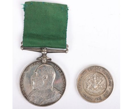 A nice Edwardian Volunteer Long Service medal to the East London Royal Engineer Volunteers with a named Territorial Forces Ex