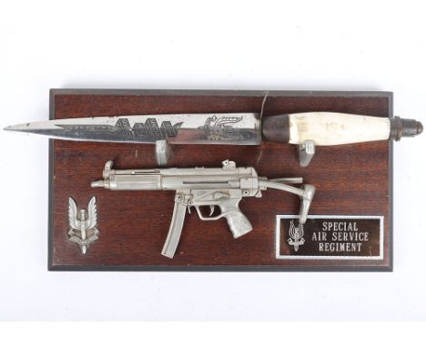 Special Air Service Regiment Plaque and Knife: Small wood plaque with SAS badge, metal SA80 model  in AF condition  and plaqu